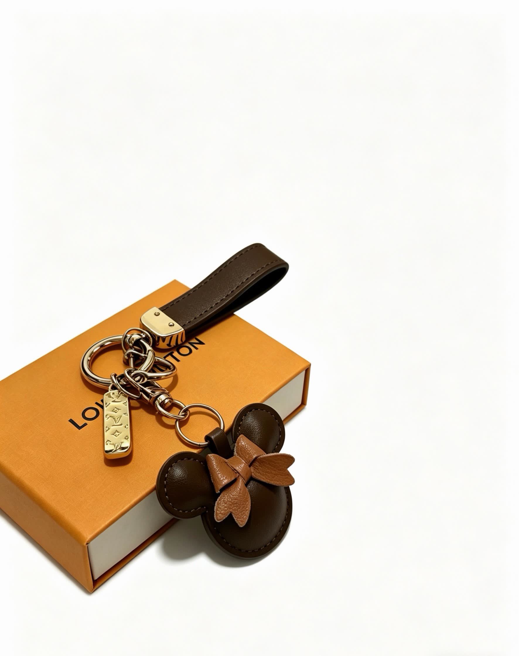 Louis Vuitton Leather Keychain with Mickey Mouse Charm